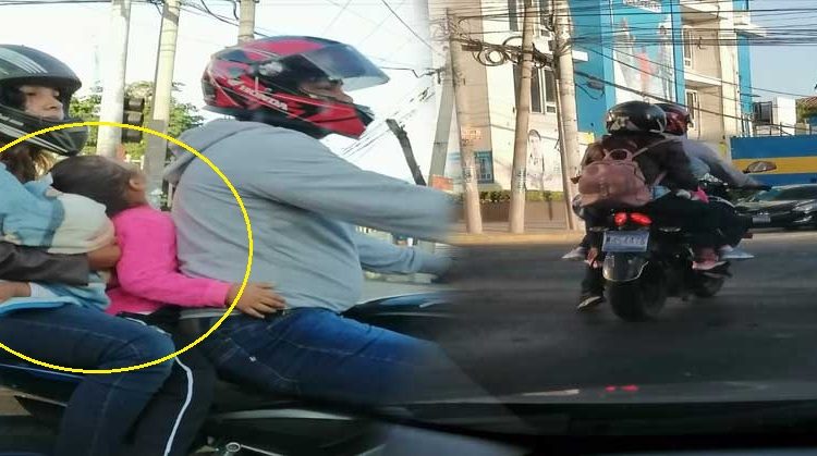 Padres arriesgan la vida de sus pequeños al circular sin protección por las calles de San Salvador