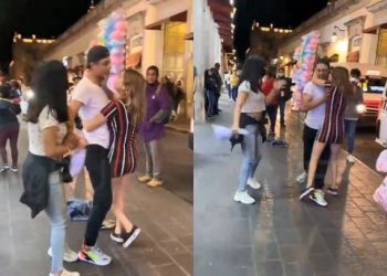 Una mujer le ruega de rodillas y jalonea a su exnovio en plena vía pública para que vuelva con ella